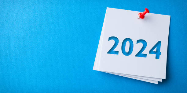 istock White Sticky Note With Happy New Year 2024 And Red Push Pin On Blue Cardboard Background 1738169846
