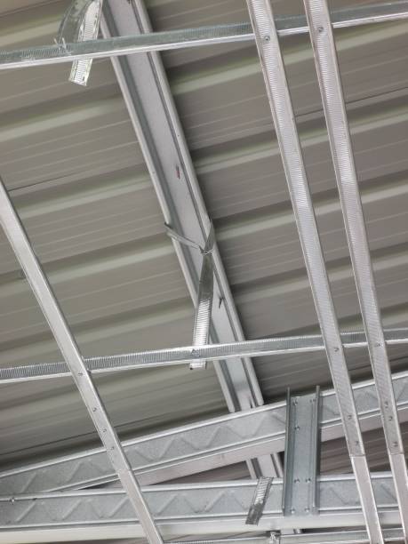 istock Aluminum ceiling structure inside of a house at construction site. 1738174383