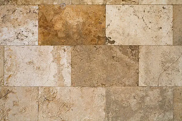 Limestone facade, detail - Travertine marble. Ideal as background pattern