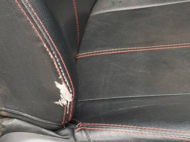 istock Ripped car seat with visible foam. 1738176473