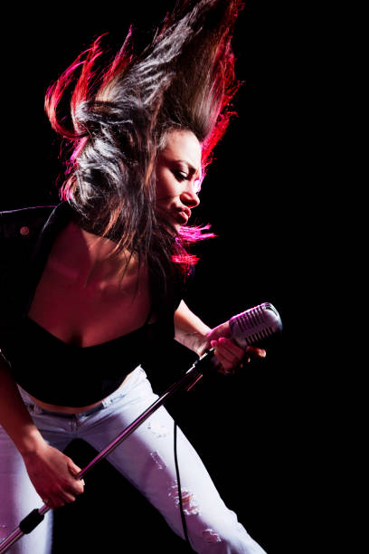 istock Woman Rocking the Microphone 173819212