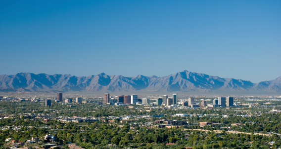 Midtown Phoenix skyline with the White Tank Mountain Range in the background