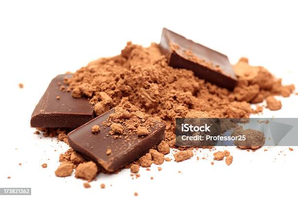 Pieces Of Chocolate In Cocoa Powder Stock Photo - Download Image Now - Chocolate, Ground - Culinary, Broken