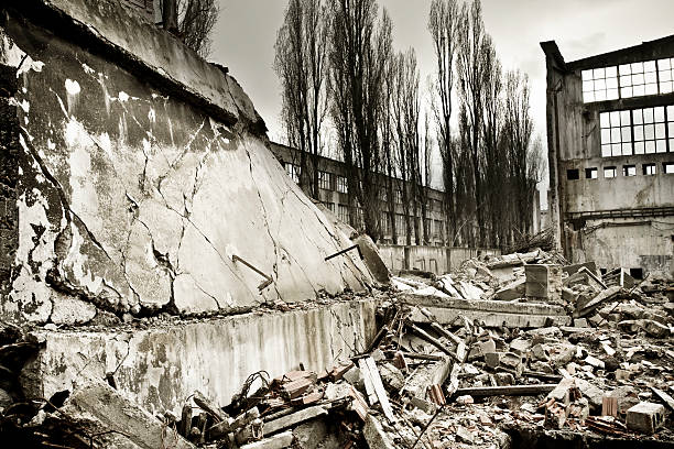 istock Destroyed industrial building wall on crisis time 173821442