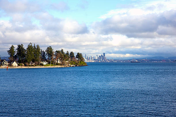 Bainbridge Island Seattle "A shot of Bainbridge Island and Seattle Skyline in the backgroundPlease, check out my growing collection of Seattle & Vancouver images. Click on the pictures below." bainbridge island photos stock pictures, royalty-free photos & images