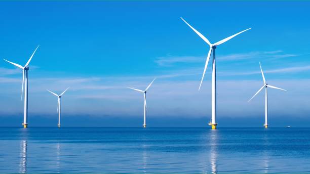 istock offshore windmill park with clouds and a blue sky 1738217966