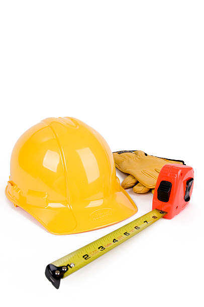 istock Yellow Hardhat, Tape measure, and Work Gloves 173822259
