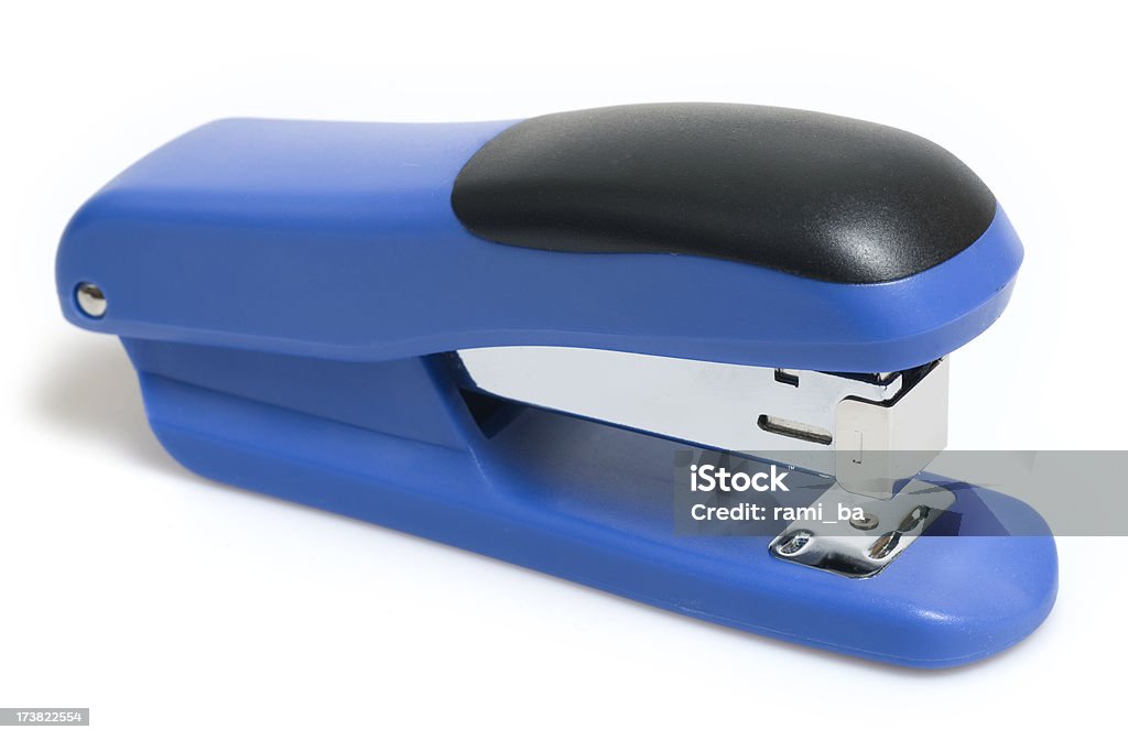 Blue stapler Blue stapler isolated on a white background. Blue Stock Photo