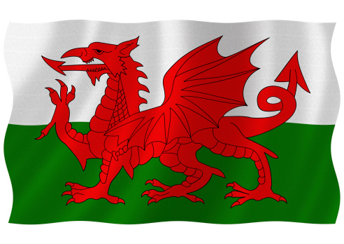 Flag of wales waving with highly detailed textile texture pattern