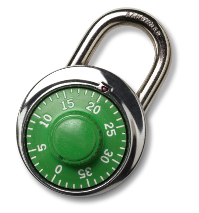Combination padlock isolated against a white background.