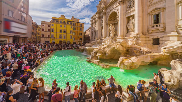 Time lapse of tourist looking at Trevi Fountain Majesty : Rome's Iconic Landmark Awash in Sunshine, Italy, Europe.