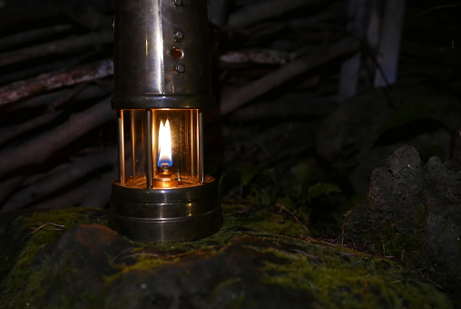 Camping at Lake Kawaguchi, Mt. Fuji in Japan. Beautiful warm light oil lamps, gasoline lanterns and logs.