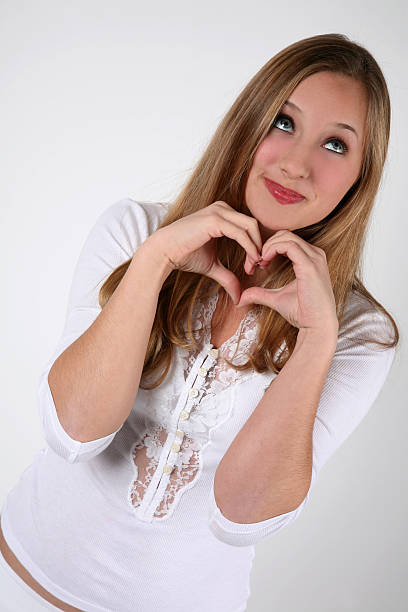 istock Young Girl making a heart 173826511