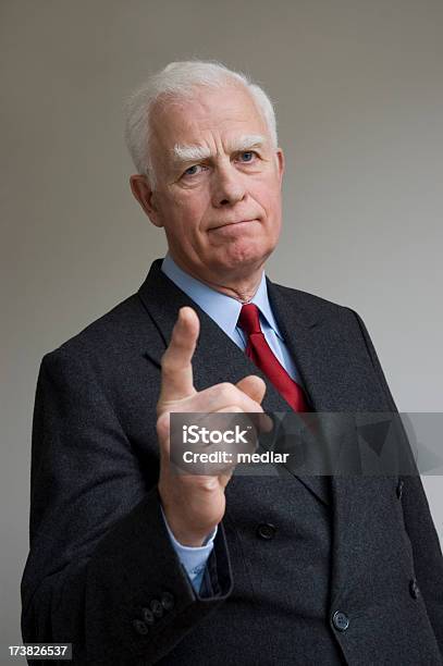 Smart Businessman Giving Stern Advice Stock Photo - Download Image Now - 60-69 Years, Adult, Adults Only