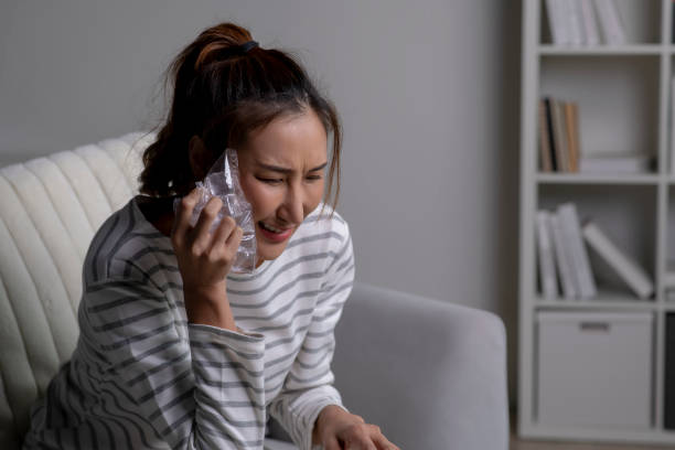 istock Female are experiencing problems with their dental health. 1738269711