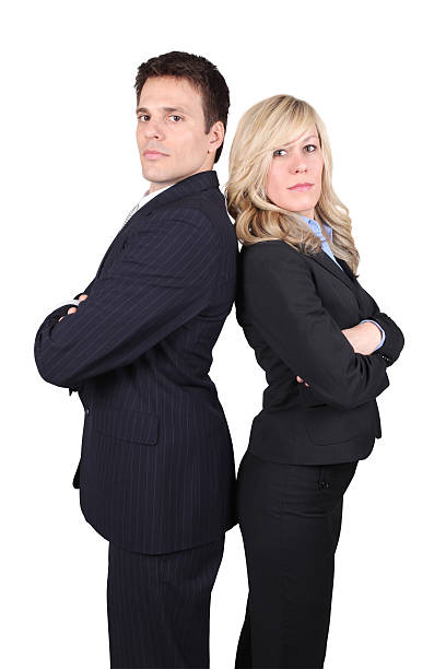 istock Businessman and woman stand off 173827657