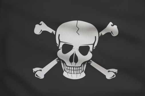 waving Jolly Roger pirate flag