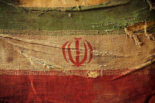 Iranian flag in grunge and vintage style.