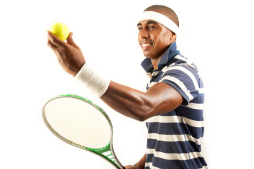 A young man with a tennis racket.