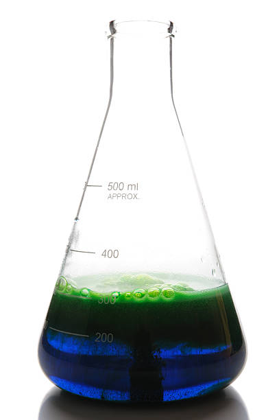 istock Colorful Foaming Chemical Reaction in Flask 173829154