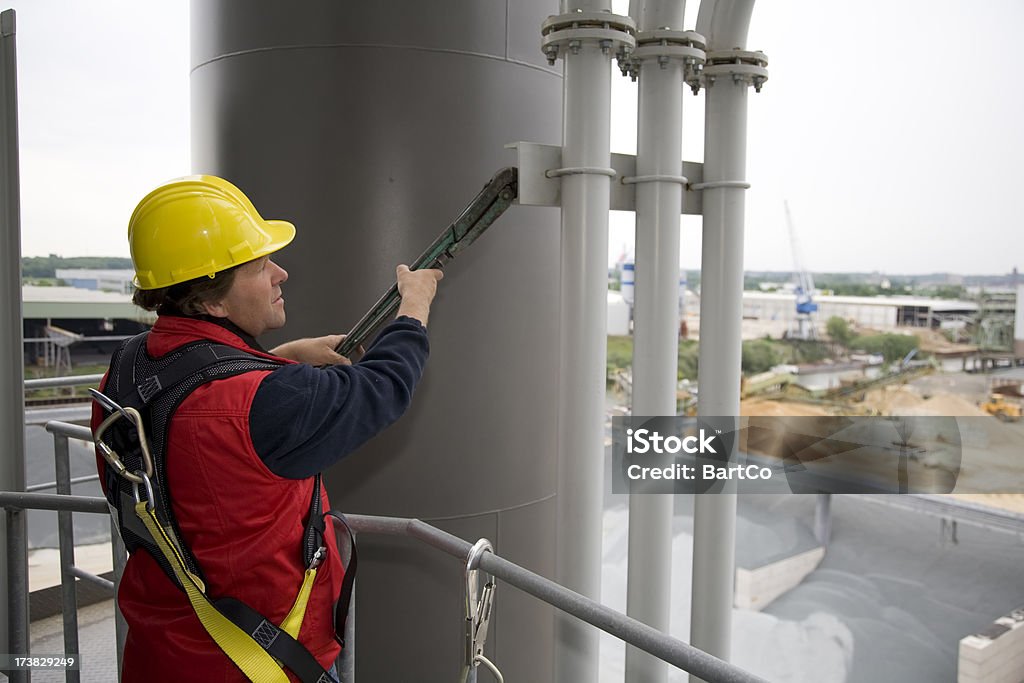 Repairman and mechanic at work with his tools. If you want more images with a construction worker (with tools) please click her. Pipefitter Stock Photo