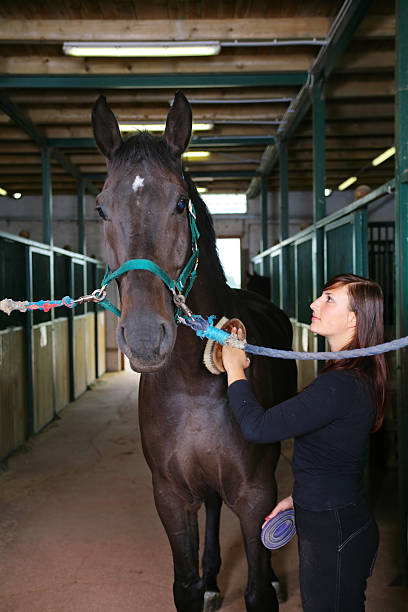 istock Woman and her horse 173829338