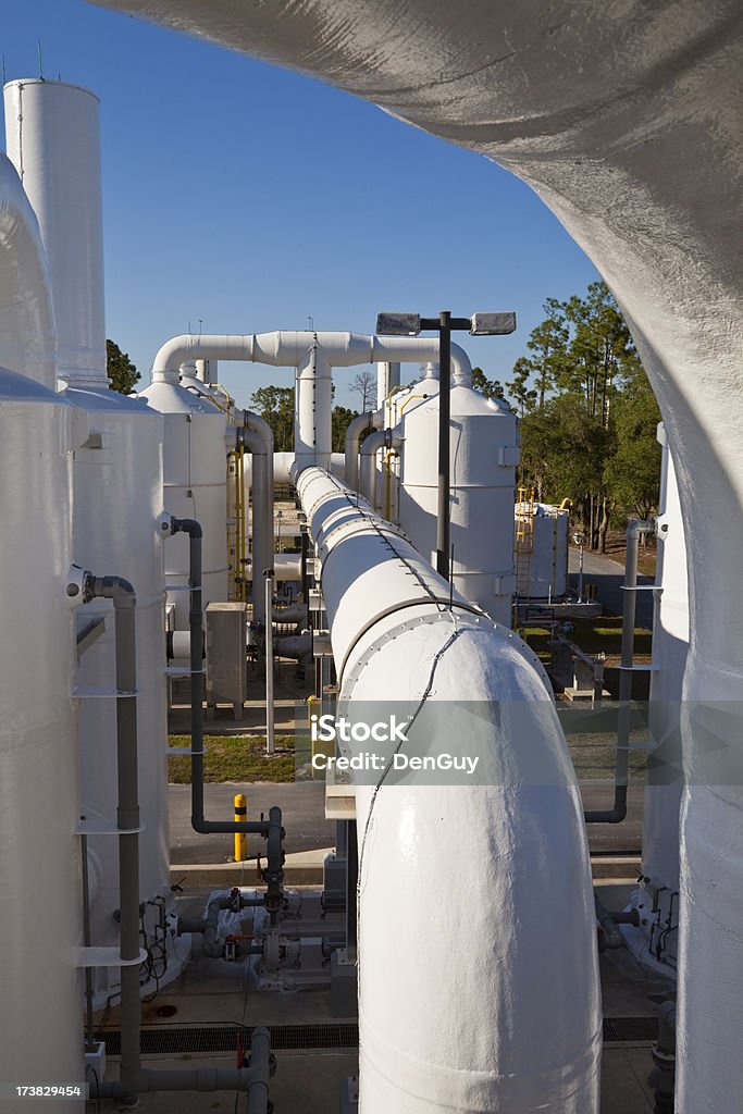 Impianto di purificazione delle acque fine giornata ombre - Foto stock royalty-free di Impianto di depurazione dell'acqua
