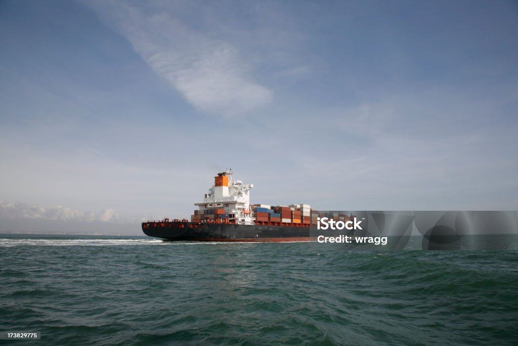 Container Ship at Sea Worldwide exporting. Containers on a ship exporting global trade. Copy spaceClick on the link below to see more of my shipping  images Activity Stock Photo