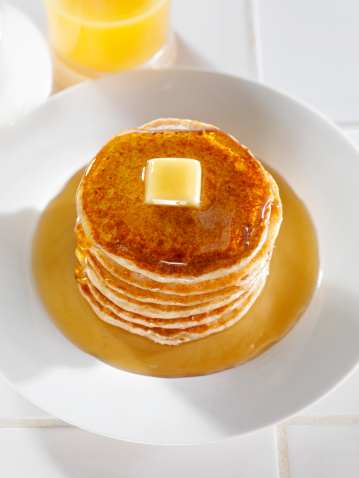 Whole Wheat Pancakes with Syrup and Butter -Photographed on a Hasselblad H3D11-39 megapixel Camera System