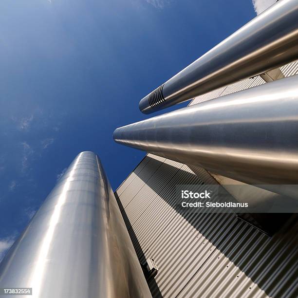 Metal Heating Pipe On Factory Building Facade Stock Photo - Download Image Now - Abstract, Angle, Architecture