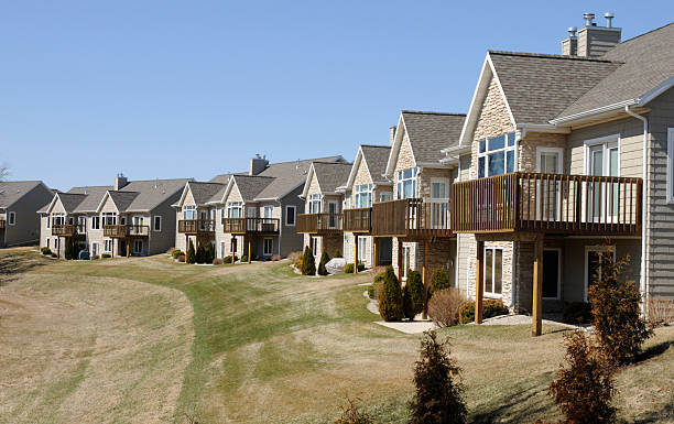 istock Condominiums All the Same; Long Line of Identical, Repetitious Condos 173832669