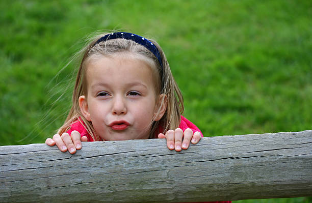 istock Girl playing hide and seek 173832767