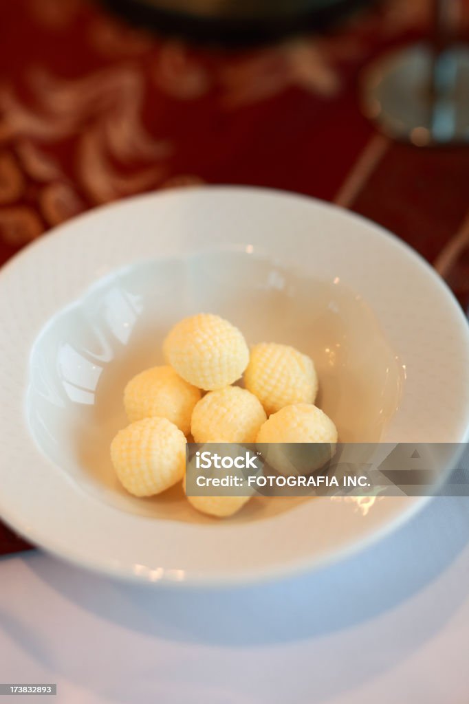 Butter Balls Butter balls in a plate set for dinner. Appetizer Stock Photo