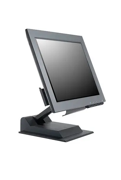 Black flat screen computer monitor viewed from three quarter angle.