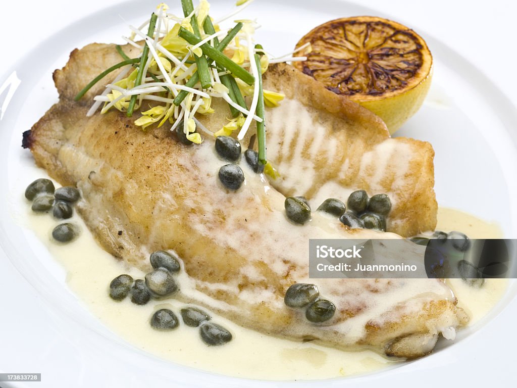 Saute fillet of tilapia with Capers Sauce Saute fillet of tilapia with Capers Sauce  (this picture has been taken with a Hasselblad H3D II 31 megapixels camera) Tilapia Stock Photo