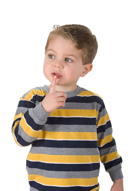 istock Boy Finger on Lips Looking To Side. Isolated & Clipping Path. 173833770