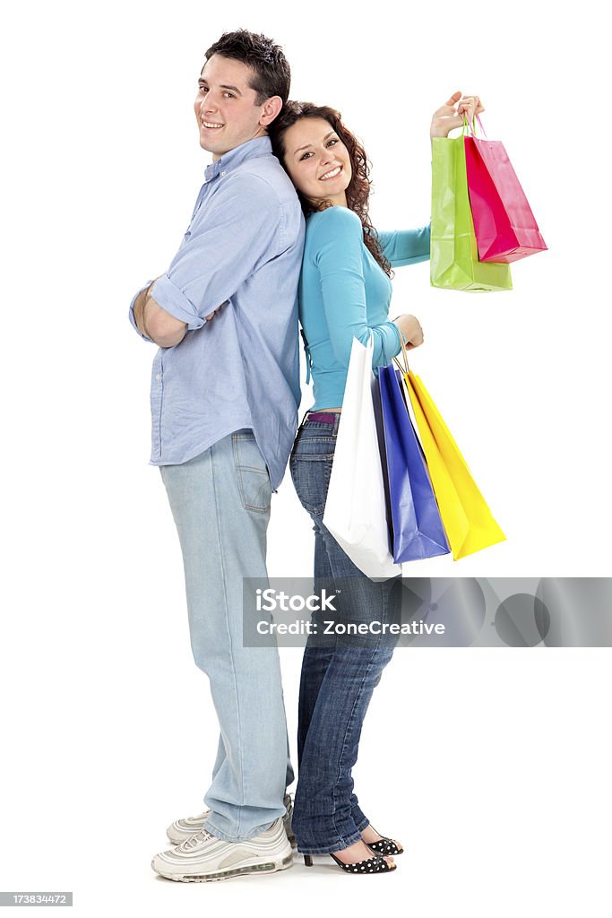 Jovem bonito Casal apaixonado, fazer compras isolado a branco - Royalty-free Adulto Foto de stock