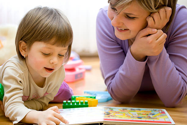 istock Mother teaching her little child 173834658