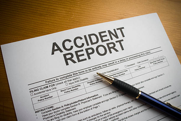 istock Accident report form on a desk with a pen 173835120