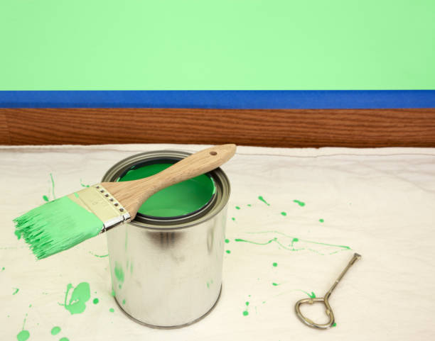 istock Green Paint Can ,Paintbrush, and Painted Wall 173835793