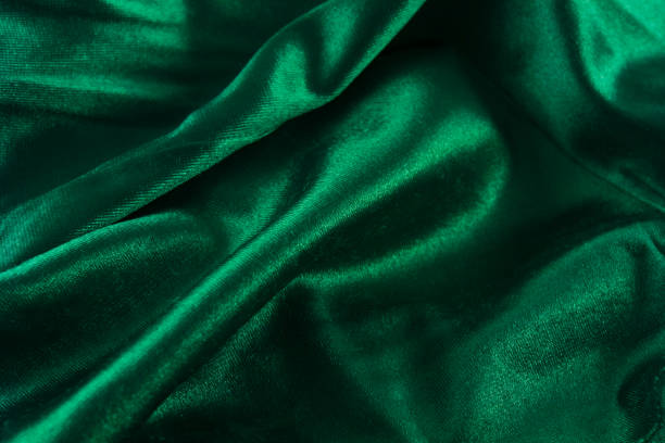 шелковистый фон зеленый ткань - canvass стоковые фото и изображения