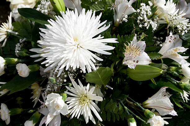istock White lily and chrysanthemum bouquet 173836752