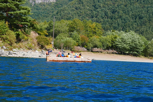 Kayak and canoe at Lake Saiko near Mt. Fuji. The calm water surface is calm and pleasant.