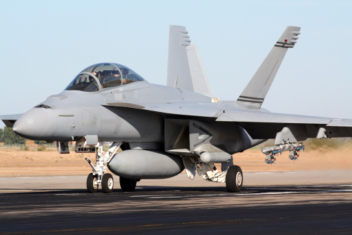 An F/A-18 Super Hornet taking off.