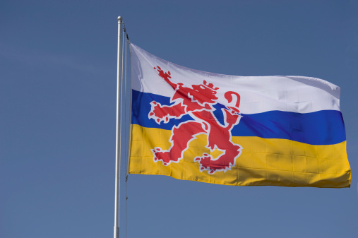 London, UK, September 2022: The Royal Standard of the United Kingdom waving the wind along with the UK flag