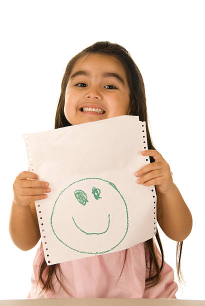istock Little girl showing crayon drawing 173837499