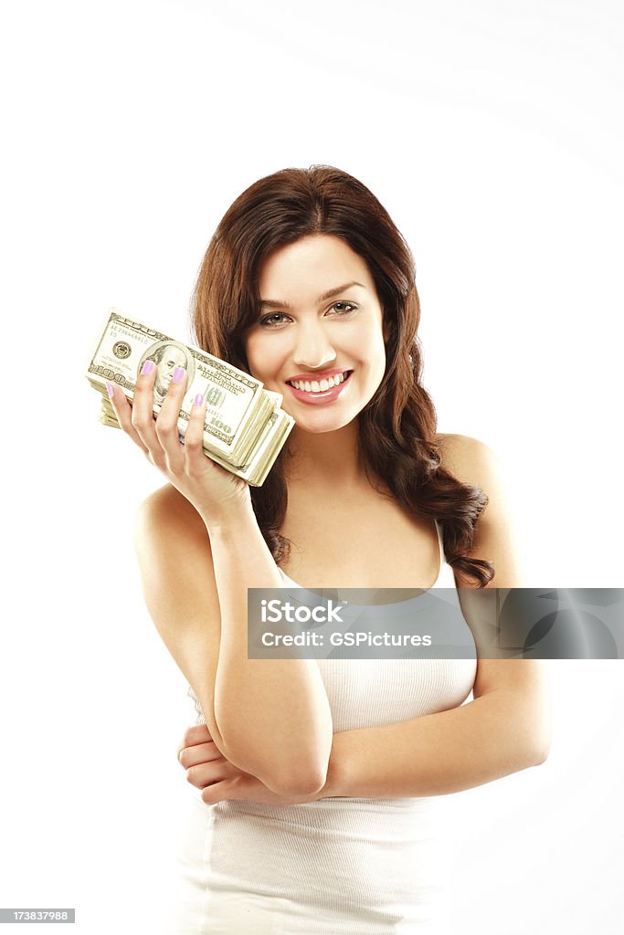 Bellissimo brunette donna che tiene una pila di denaro - Foto stock royalty-free di 20-24 anni