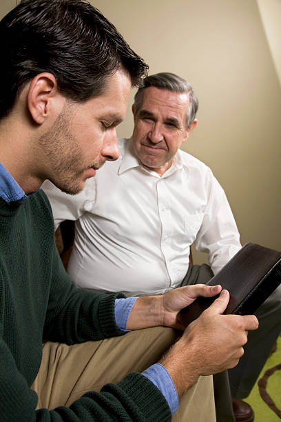 istock Pastor Praying Over A  Church Member 173838238