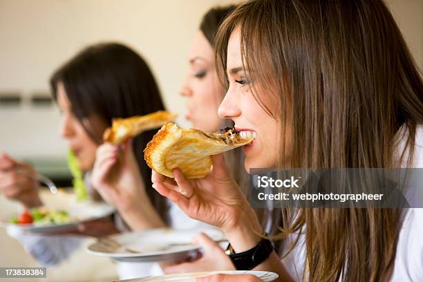 Eating Pizza Stock Photo - Download Image Now - Eating, In A Row, Pizza