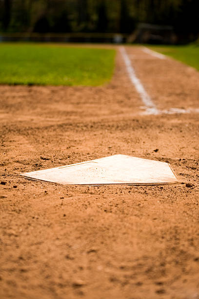 istock A white home plate on a baseball field 173838467